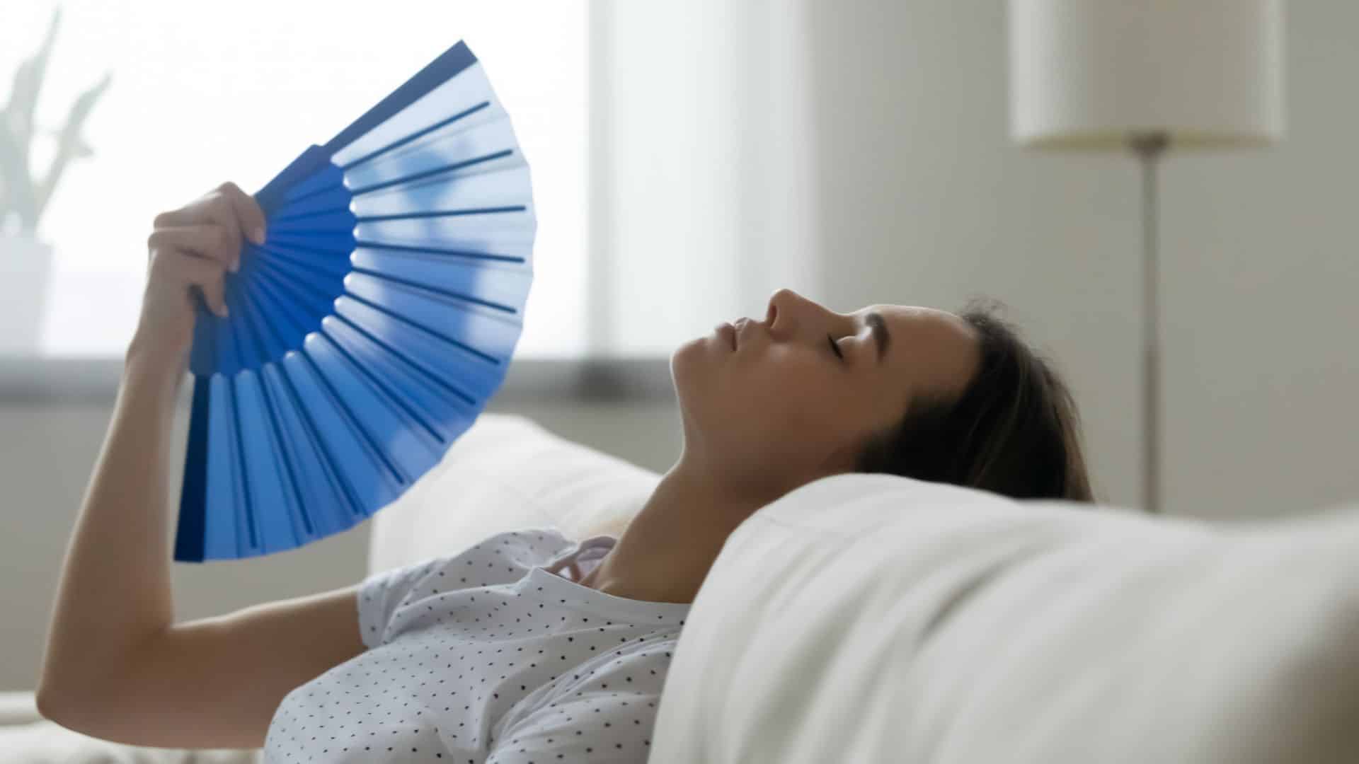 person using a fan